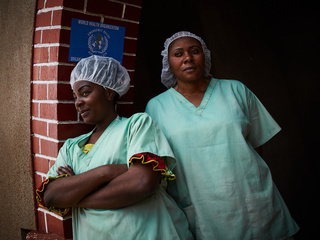 Health workers Claudine (L) &amp; Rebecca at an Ebola treatment centre in Butembo.<br><br>North Kivu is the epicentre of Congo's 10th Ebola epidemic, an outbreak declared a global health emergency by the World Health Organization.