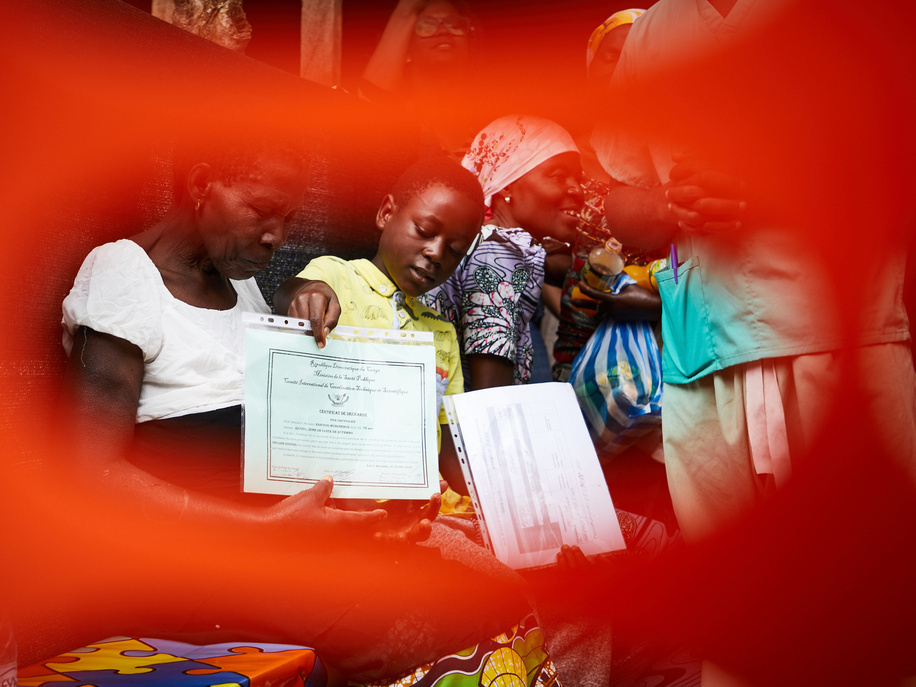 Isidore Mumbere (12) and Kaninga Muhenenge (70-on left), survivors of Ebola are seen here at an Ebola treatment centre in Butembo, holding certificates that declare them free of the virus.<br><br>North Kivu is the epicentre of Congo's 10th Ebola epidemic, an outbreak declared a global health emergency by the World Health Organization.