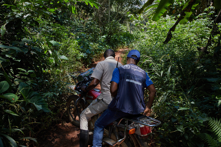 World Health Organization staff travel by motorcycle to Makangalo, Ituri Province.<br><br>This outbreak of Ebola has been rife with logistical challenges of delivering health care and monitoring for new cases in some of the most remote regions of the country.<br><br>North Kivu and Ituri Provinces are the epicenter of Congo's 10th Ebola epidemic, an outbreak declared a global health emergency by the World Health Organization.